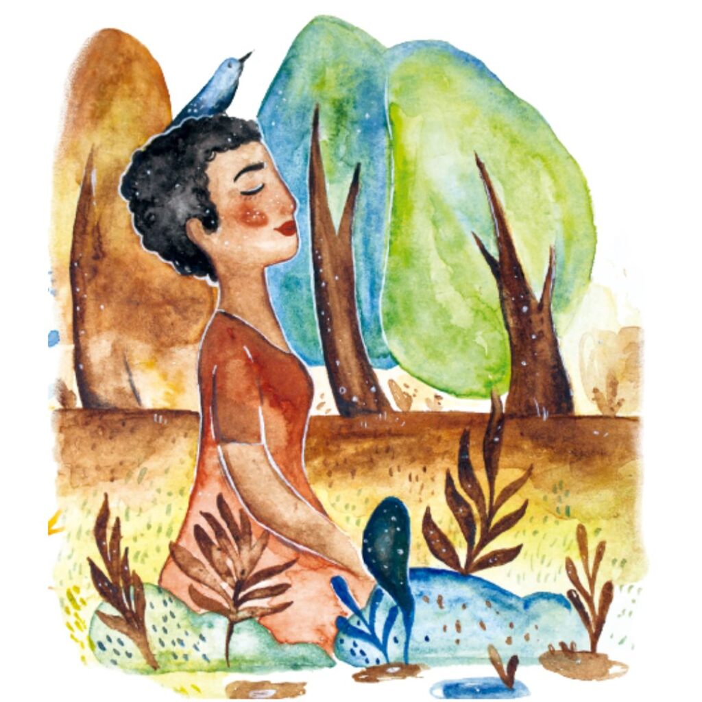 Mulher sentada meditando em meio a natureza.